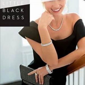 The Everlasting Necklace Touchstone Swarovski‘s little black dress collection.